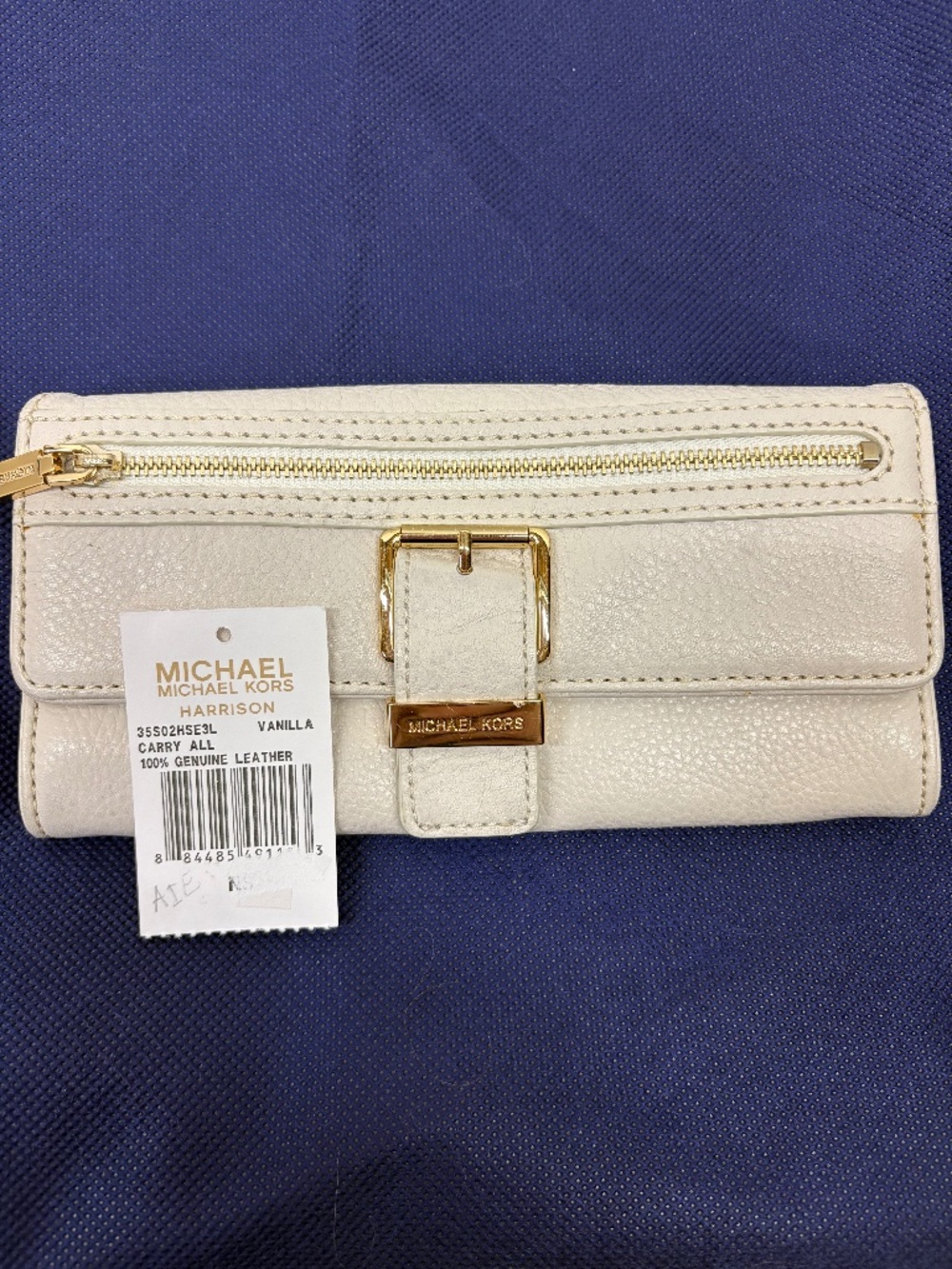 Michael Kor’s Leather Wallet